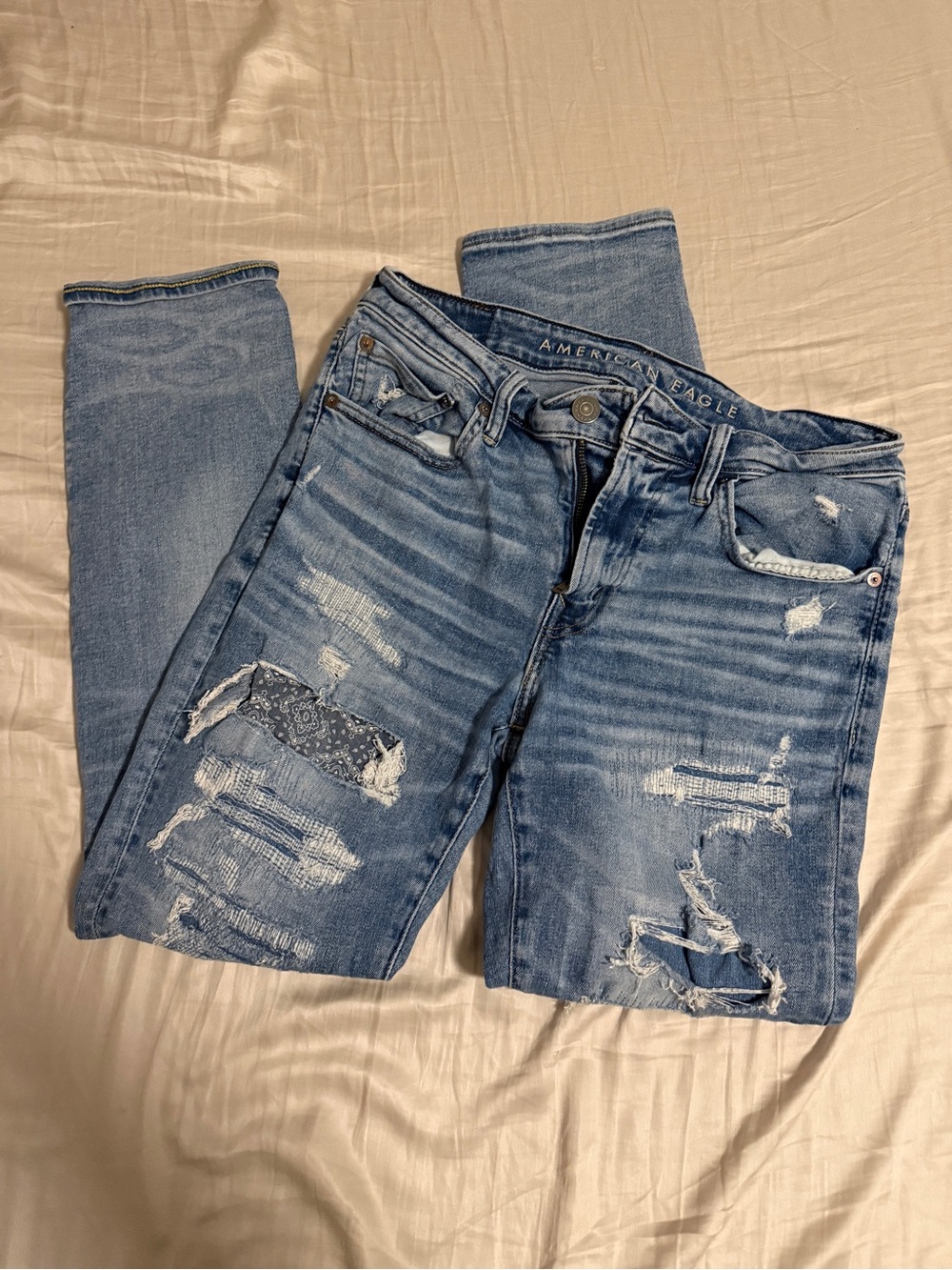 American Eagle Outfitters Light Wash Distressed Slim Jeans